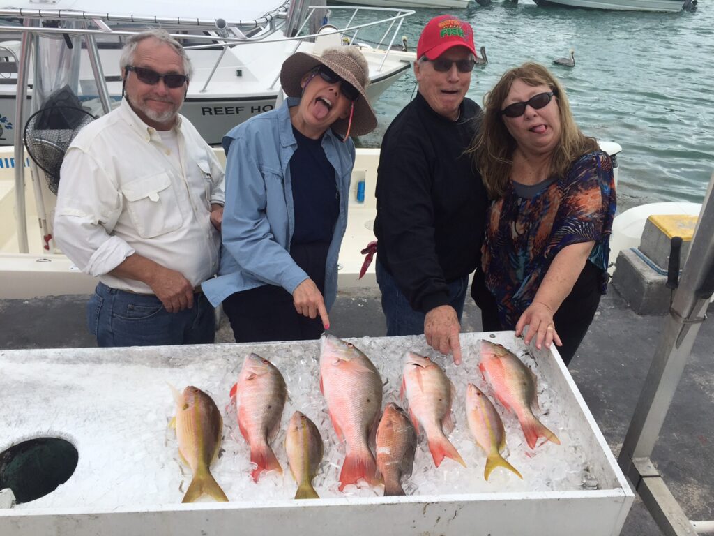 The laughing Linda's and their men.  Tough conditions led to fun fishing in a late rally